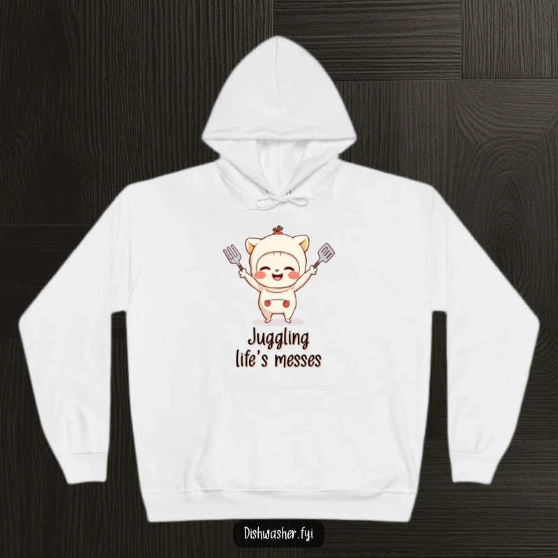 Funny hoodie featuring a mischievous character with a grin juggling kitchen utensils, perfect for cozy and playful moments.